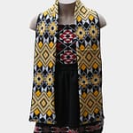 Warm knitted Māori scarf showcasing Kapa Haka Makers' distinctive Tāniko design in yellow, black, and white.