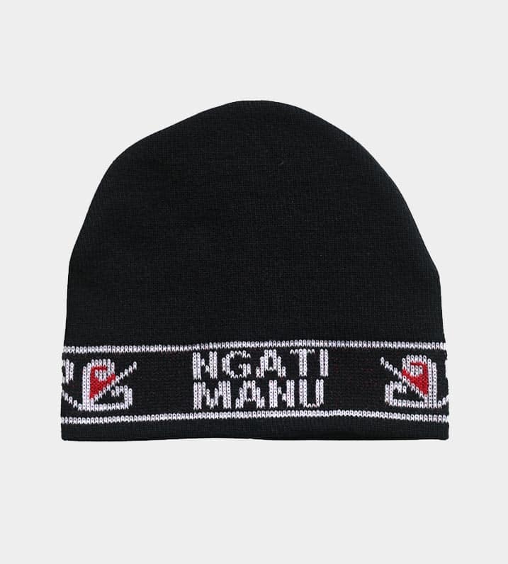 Black knitted Māori Iwi beanie with a white and red border pattern, and white lettering spelling "Ngati Manu" across the front.