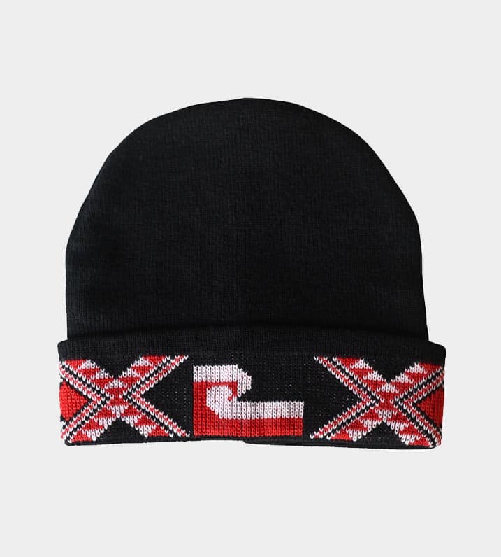 Black knitted beanie with the a Māori Tāniko bordered pattern, and Tino Rangatiratanga Flag stitched into the turned up band.